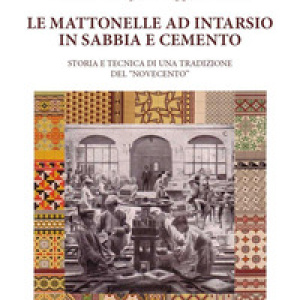 Le mattonelle ad intarsio in sabbia e cemento